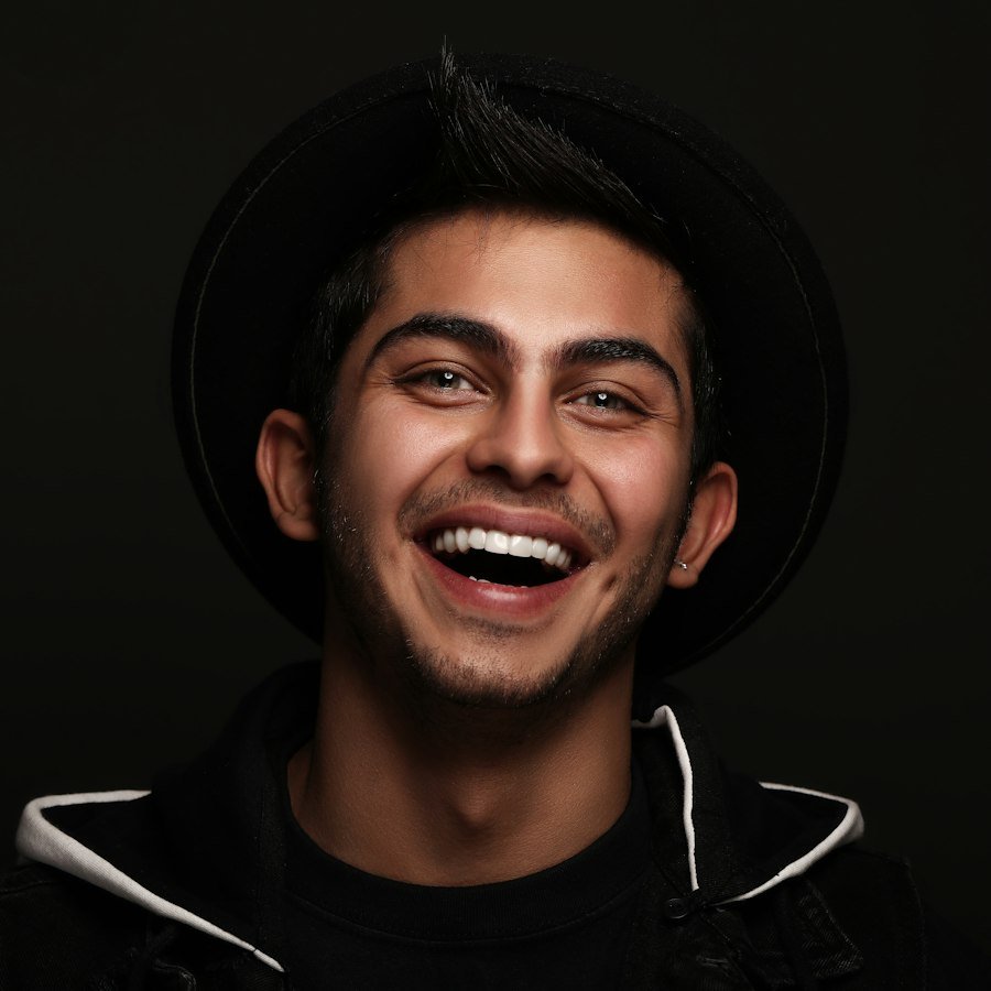 Man smiling with naturally reshaped front teeth